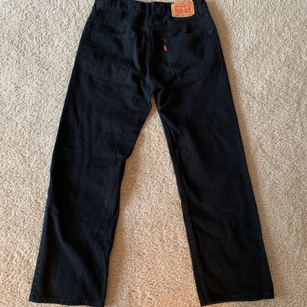 Levi’s 550 black raw denim jeans